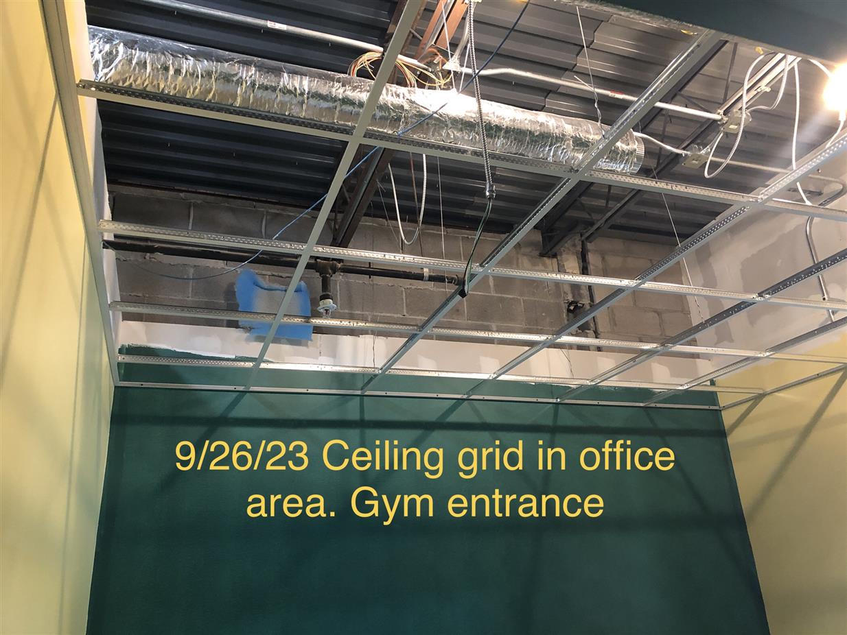 Ceiling grid in office area near gym entrance
